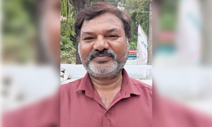 Protesters holding banners during a nationwide general strike call against labour codes