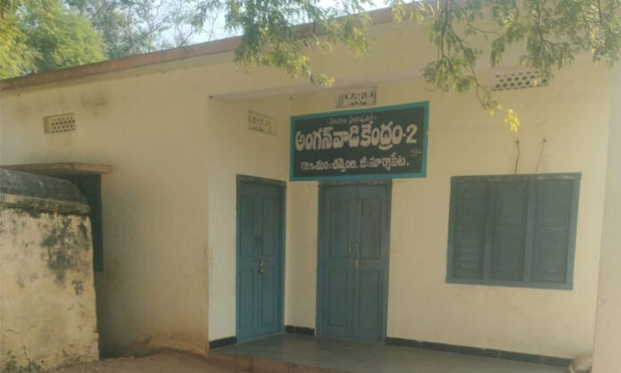 Parents raising concern over Anganwadi center not opening on time at mandal bus stand and running two centers in one building
