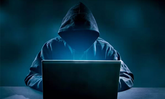 Man using mobile phone for online stock trading highlighting YouTube investment scam case in Boduppal