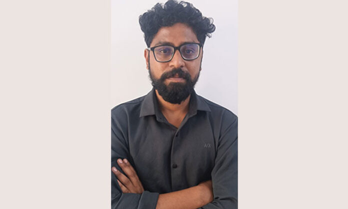 Police taking accused into custody after a public nuisance and assault incident in Vanasthalipuram