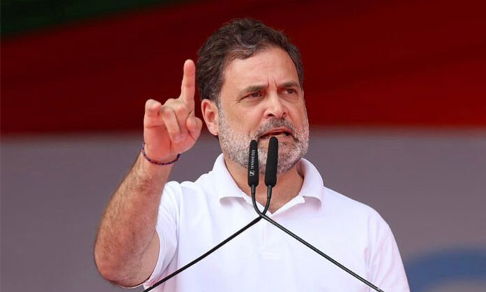 Opposition leader addressing public gathering criticizing government over trade deal