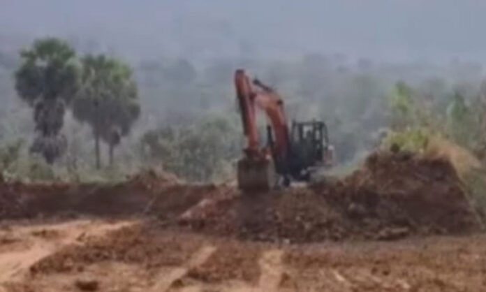 Illegal red soil mining and transportation in Mangapet mandal of Mulugu district using JCBs without permissions