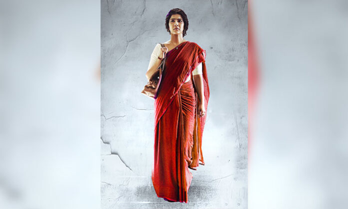 Varalakshmi Sarathkumar in red saree first look poster of Saraswathi launched by Samantha