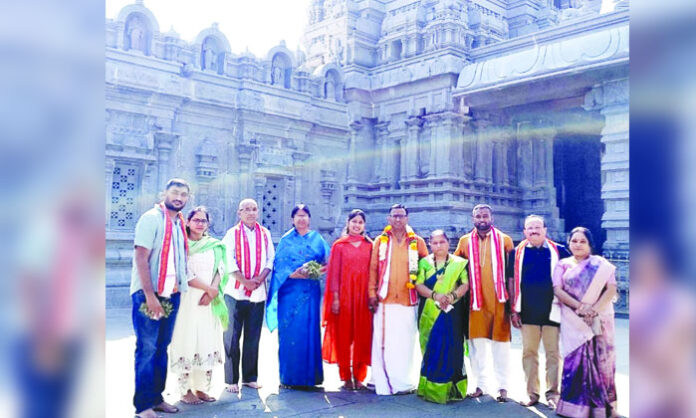 Aadab Hyderabad Newspaper Chairman Satyam Veeramalla offering prayers at Lord Sri Lakshmi Narasimha Swamy temple with family