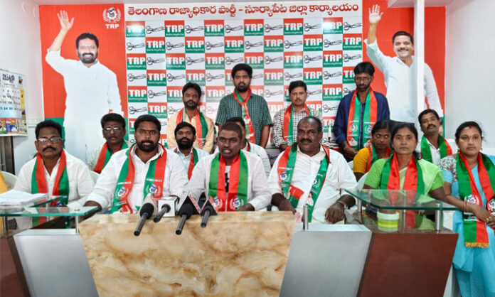TRP district president Mangodi Anjaiah addressing media in Suryapet demanding suspension of CI Yedukondalu and CI Rajasekhar