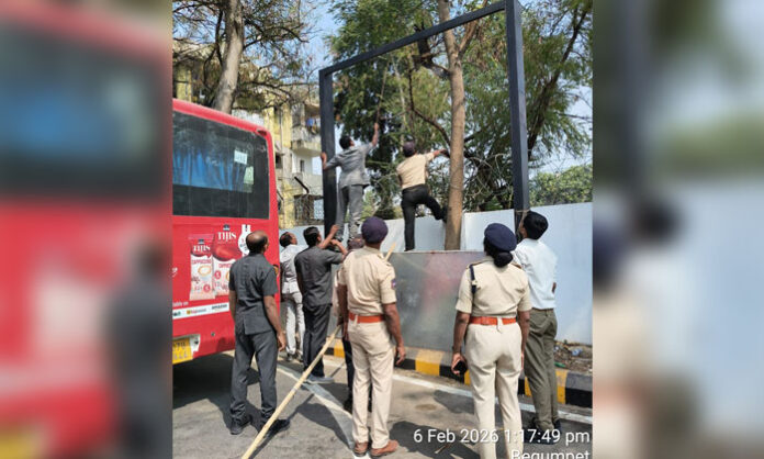 Traffic police rescuing an eagle trapped in prohibited kite string at Begumpet Traffic Training Institute