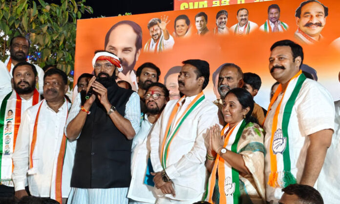 State Minister Uttam Kumar Reddy addressing a public meeting at Gandhi statue center during Suryapet municipal election campaign