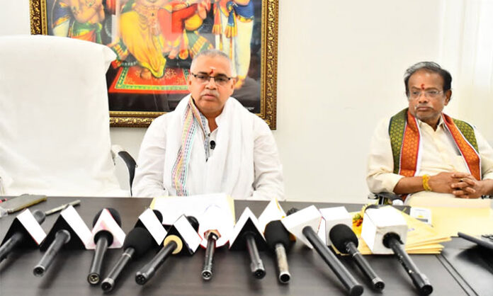 Yadadri Temple illuminated with lights during Brahmotsavams with priests performing rituals