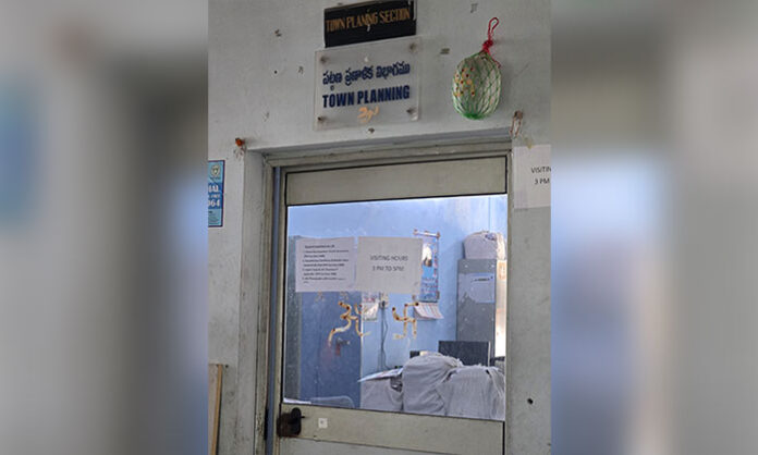 ACB officials conducting a surprise raid at Serilingampally Circle-49 office in Telangana, inspecting town planning and engineering files