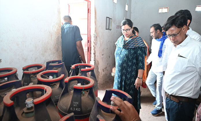 District Collector inspecting gas cylinder godown in Sarangapur to review safety standards and LPG supply arrangements