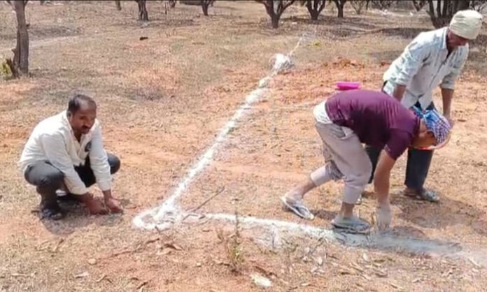 Groundbreaking ceremony of the working women’s hostel at Jawahar Nagar with local residents and officials participating.