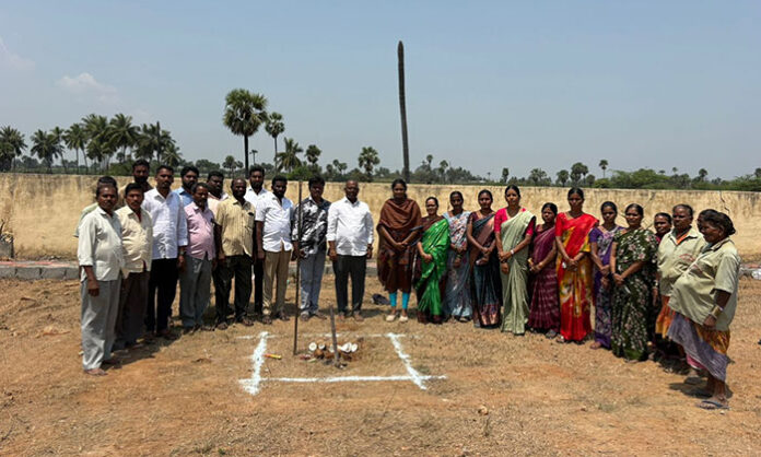 Groundbreaking ceremony for DWCRA women association building in Bandaravirala attended by village leaders and officials.