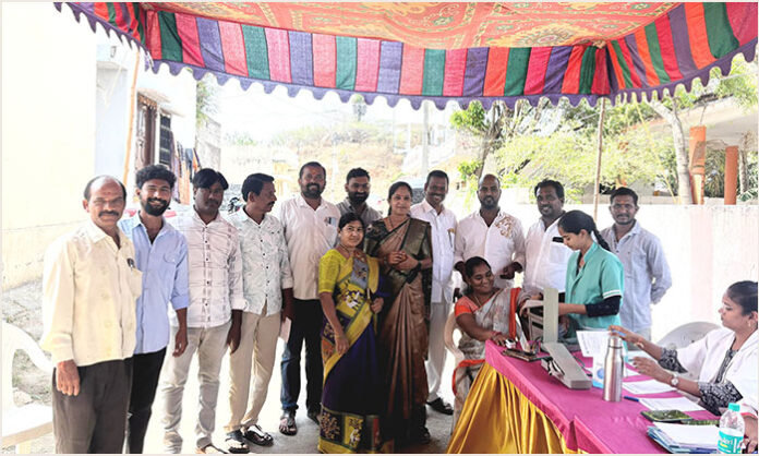Residents attending free medical camp in Abdullapurmet village under Praja Palana Pragathi Plan initiative.