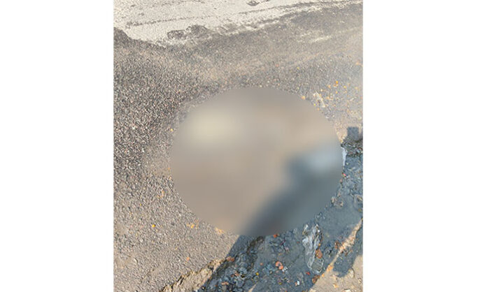 Overflowing drainage in Kistapur Pudur causing sanitation issues and inconvenience to motorists and school students, raising concerns over GHMC response.