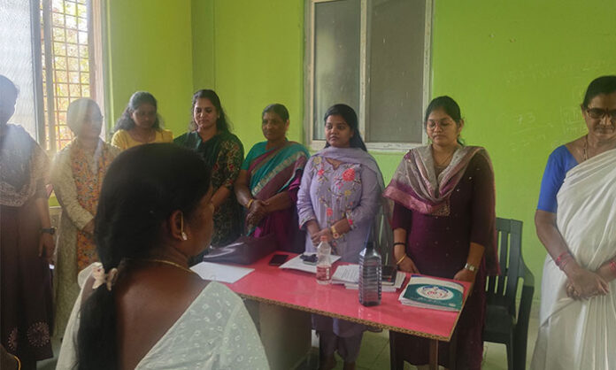 Health officials guiding ASHA workers during a review meeting at Parvathagiri Primary Health Centre in Warangal district