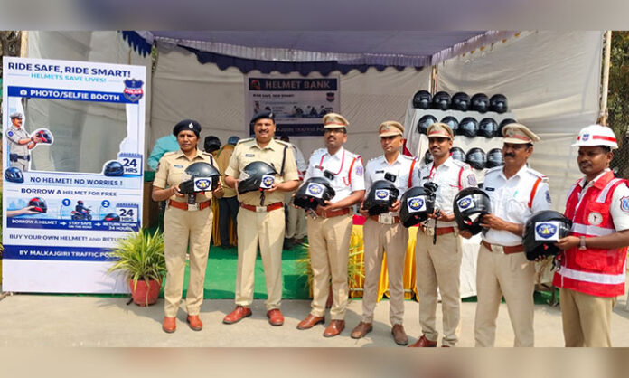 Road safety awareness drive conducted by Malkajgiri Police Commissionerate in Neredmet Vayupuri distributing helmets to riders