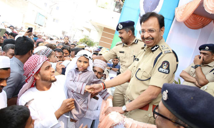 City Police Commissioner VC Sajjanar, IPS, supervises security and participates in Eid-ul-Fitr celebrations at Mir Alam Eidgah Hyderabad, distributing chocolates to children and extending festive greetings.