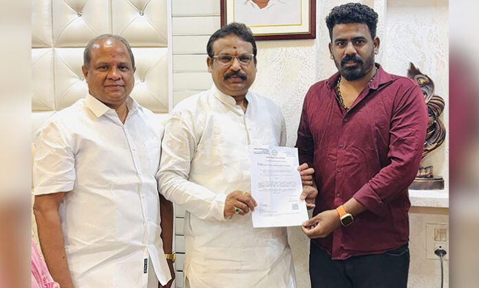 Shri Ganesh providing LOC medical assistance to Ramadevi for treatment at Nizam Institute of Medical Sciences