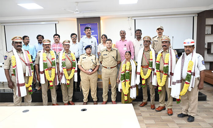 Malkajgiri Police Commissioner honoring retiring officers during a ceremony at the Commissionerate office.