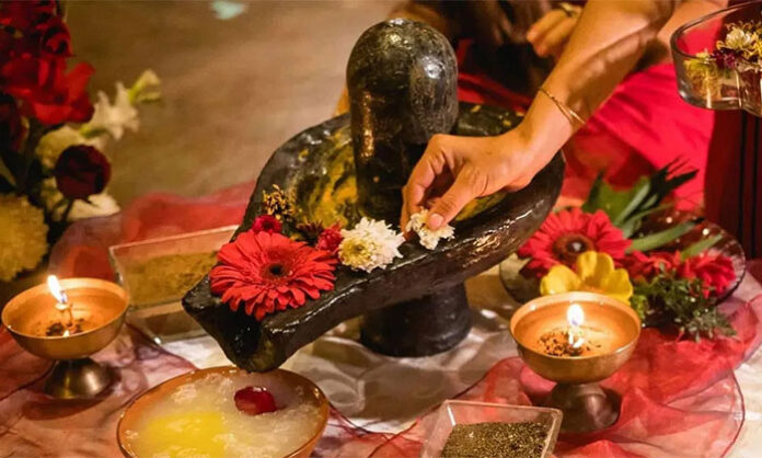 Devotees performing Lord Shiva lamp lighting ritual on Monday to seek blessings and remove obstacles.