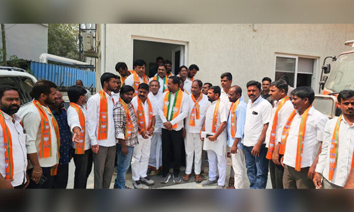 Leaders from Congress and BRS joining BJP at Chilipiched Mandal event in presence of Medak MP Madhavaneni Raghunandan Rao