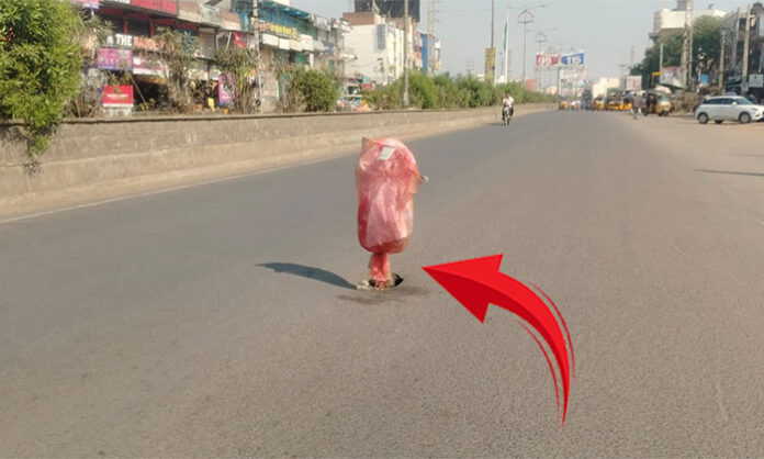 A large pothole has formed in front of the Electricity Department office near Nirmal bus stand, posing danger to thousands of motorists daily.