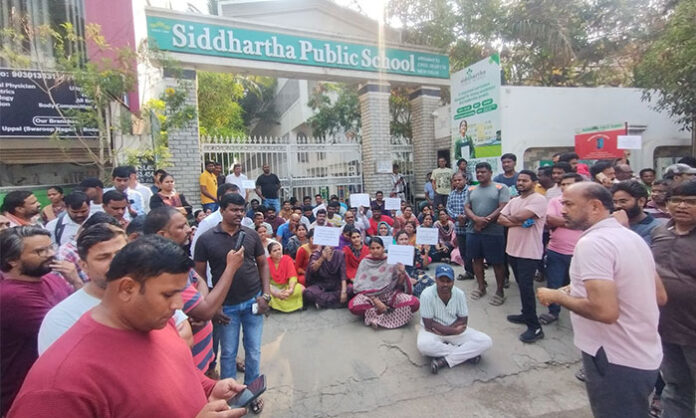Parents protesting against arbitrary fee hikes at Siddhartha Public School in Boduppal, alleging violation of CBSE norms and Telangana Fee Regulation Act.