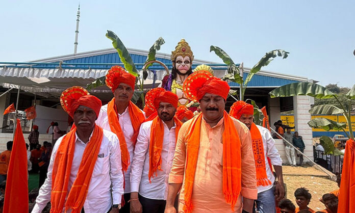 Crowd participating in the Sri Rama Navami Shobha Yatra at Devarakota Temple, Nirmal, flagged off by MLA Maheshwar Reddy, showcasing peaceful festivities and cultural preservation.