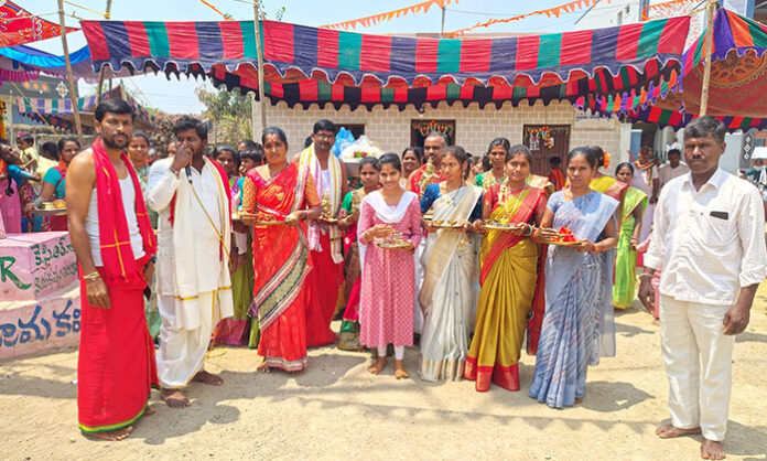 Devotees gather at Sri Veeranjaneya Temple in Biji Venkatapur to witness the grand Sri Sita Rama Kalyana ceremony, with silk offerings and Talambralu.