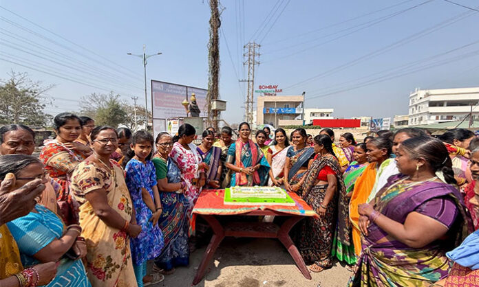 Corporator Vippala Sai Jyothi Vishnu celebrating Womens Day with women sanitation workers at Telangana Thalli statue in the 15th Division.