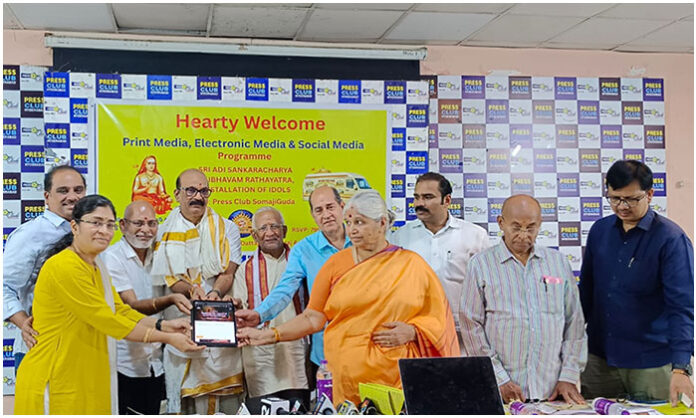 Organizers releasing brochure for Adi Shankara Rath Yatra starting from Tadbun Veeranjaneya Swamy Temple in Secunderabad