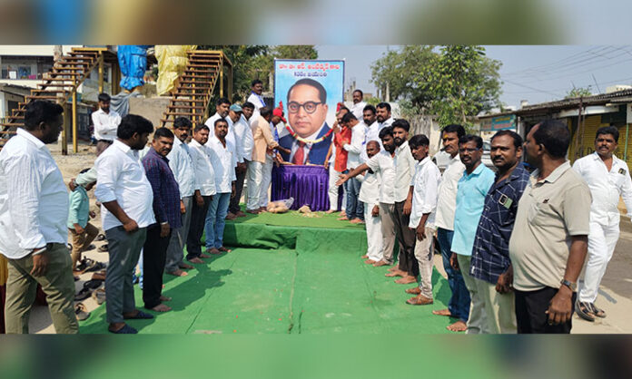 Residents and leaders paying tribute to Dr BR Ambedkar during 135th birth anniversary celebrations in Jawahar Nagar Municipal Corporation