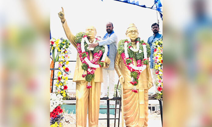 Jeevan Kumar Reddy paying tribute to Dr BR Ambedkar during Jayanti celebrations in Ibrahimpatnam