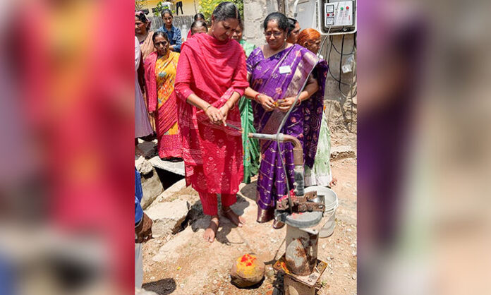 Municipal Chairperson Dava Swathi Ramesh Babu inaugurating new borewell motor in Bellampalli Ward 10