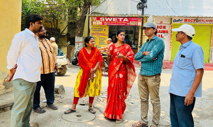 Dr Samala Hema inspecting Brahmanabasti area and interacting with residents regarding CC road works and development issues.