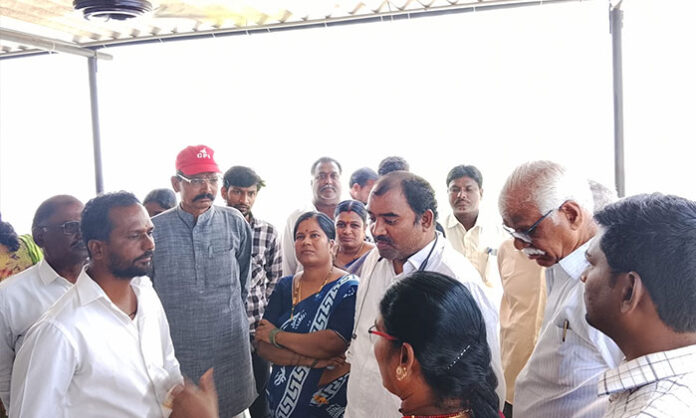 CPI leaders visiting the rented MPPS school in Gabbilala Peta, Telangana, interacting with students and staff about the need for a new government school.