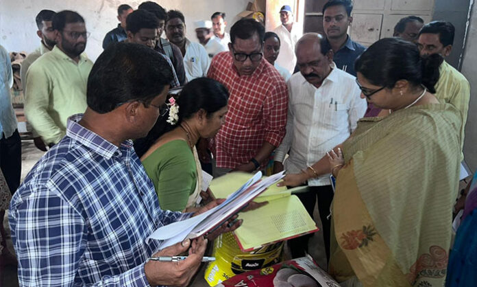 District Collector inspecting government girls ashram school kitchen, classrooms, and Indiramma house under welfare week program in Telangana