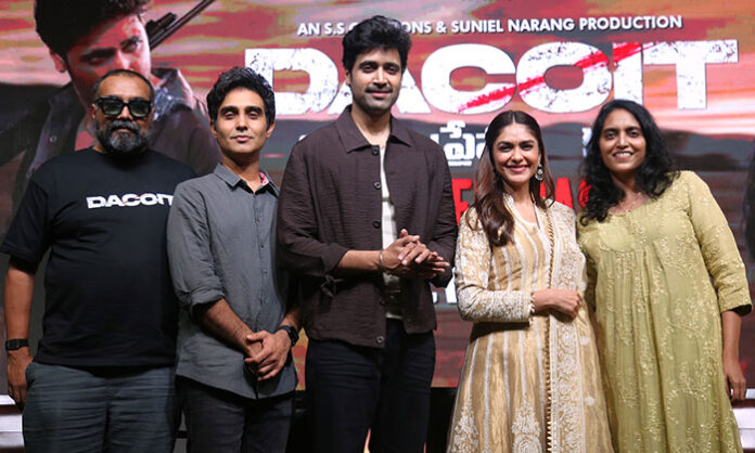 Poster of the Pan-India action-drama film 'Decoit' starring Adivi Sesh and Mrunal Thakur, showcasing intense emotions, love, betrayal, and survival, directed by Shaneil Deo.