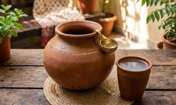 Traditional earthen pot (matka) used for storing cool drinking water in summer