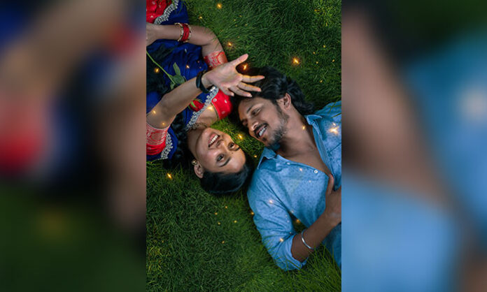 Sumanth Prabhas and Nidhi Pradeep in a romantic rural setting from Godari Gattupaina movie trailer announcement poster.