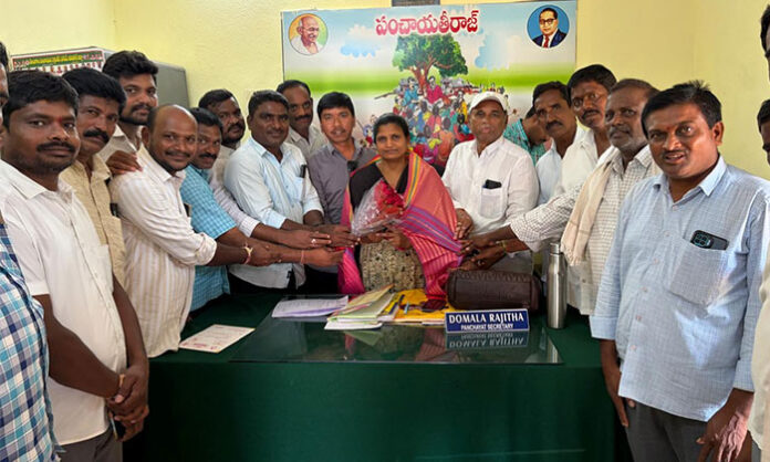 Grand felicitation ceremony in Enugallu honoring Domala Rajitha as the new Gram Panchayat Secretary with BRS leaders