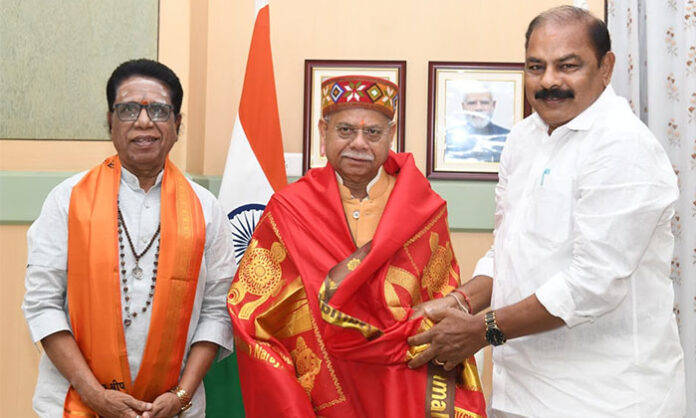 Kommuri Pratap Reddy meeting Telangana Governor Shiv Pratap Shukla at Raj Bhavan to discuss Jangaon development issues.