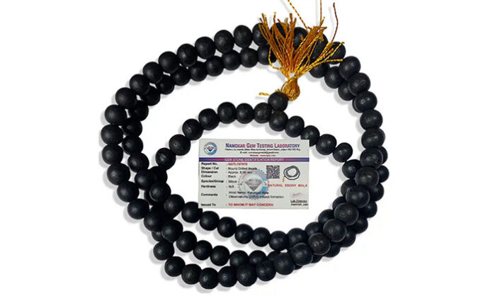 Karungali mala worn for spiritual benefits, mental peace, and positive energy.