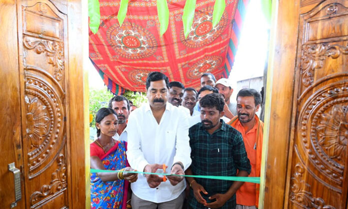 MLA KR Nagaraju inaugurating Indiramma housing scheme home for beneficiaries in Warangal district