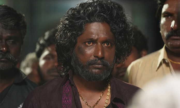 Suhas and Soori in Mandaadi movie after completion of shooting showcasing coastal action drama setting.