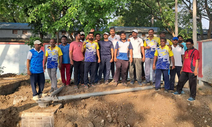 Walkers Association members protesting against Airtel tower construction near Singareni School grounds in Mandamarri