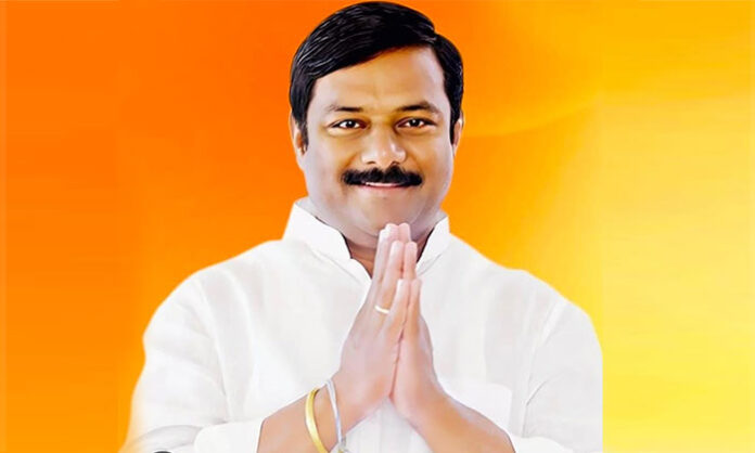 Nirmal MLA Maheshwar Reddy announcing Rs 15 crore development funds for Nirmal town while criticizing misuse by certain Congress leaders