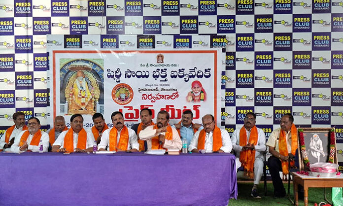 Shirdi Sai Baba United Forum members addressing press conference at Somajiguda Press Club condemning social media propaganda against Sai Baba.