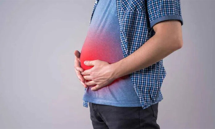 Illustration showing a person experiencing stomach bloating and natural remedies like peppermint tea and fennel seeds that help relieve digestive discomfort.