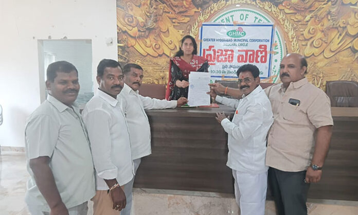 Villagers submitting complaint against waste dumping in Survey 371 Puduru highlighting pollution and public health concerns